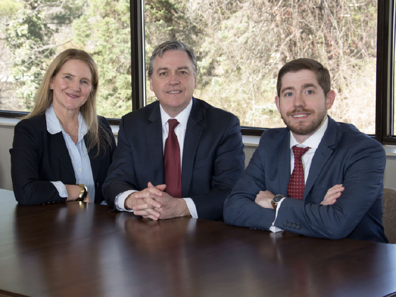 Wilson Peak Wealth Management director of operations Stacy Wilson (left), financial advisors Jeffrey J. Wilson (center) and Michael Sadowski (right)