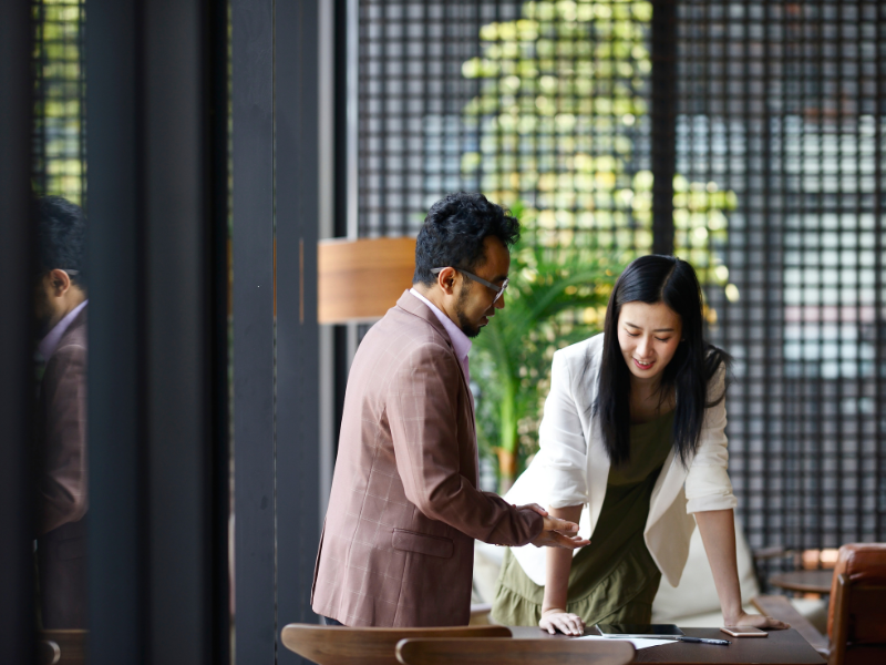 Colleagues working together in an office
