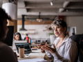 diverse group of business co-workers talking during a meeting