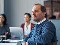 group listening in meeting at an office