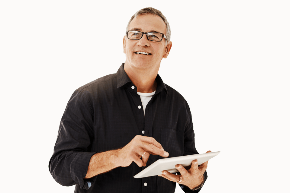 Smiling financial advisor with iPad in hand looking forward.