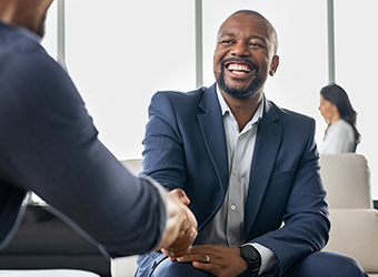 Stock imagery: Man shaking hands