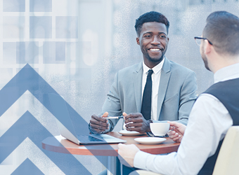 branded two business people meeting, African American, Caucasian image