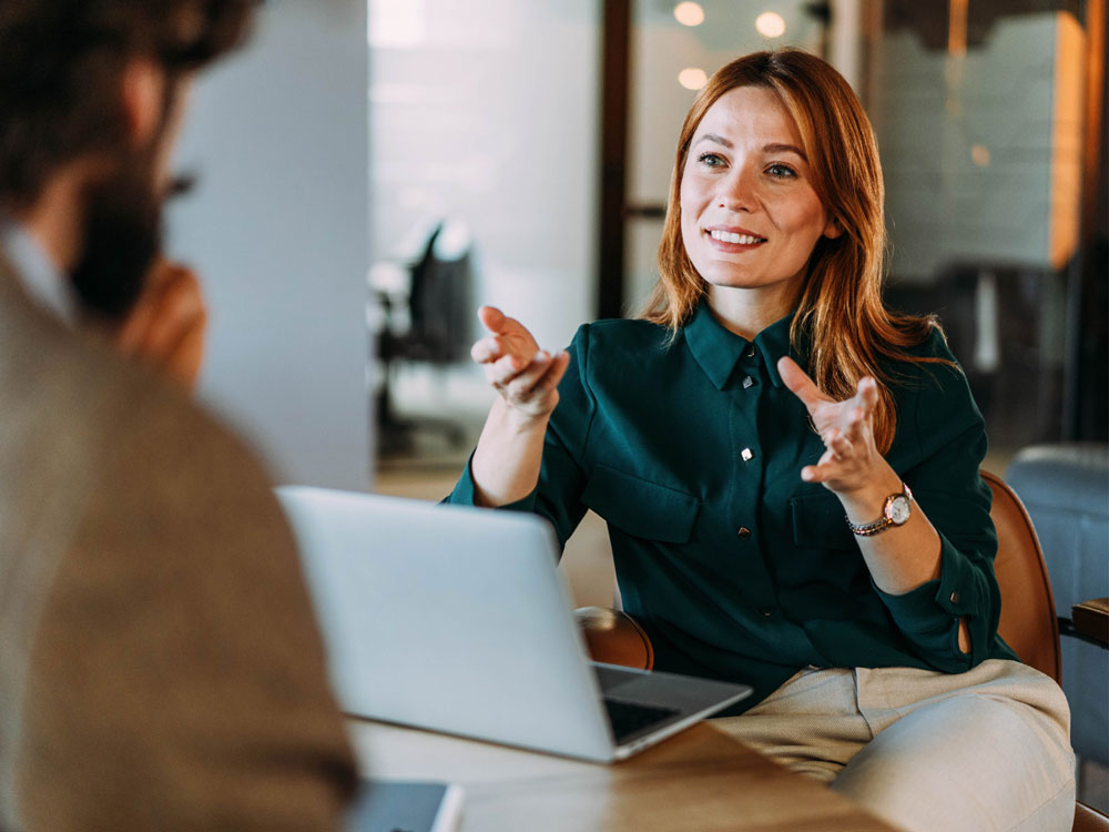 Financial advisor discussing digital concentrated stocks with investor