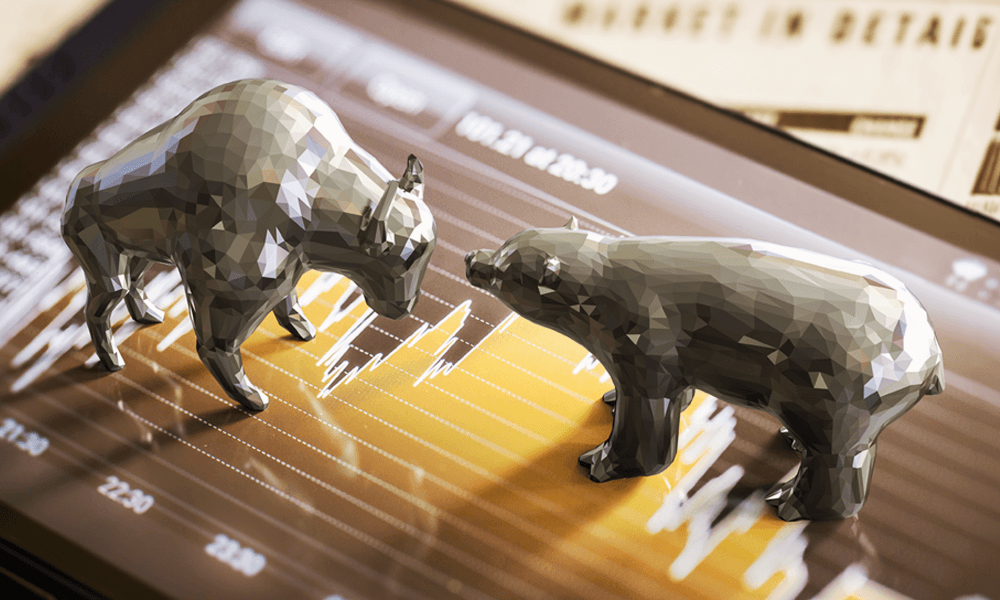 bull and bear figurines facing each other