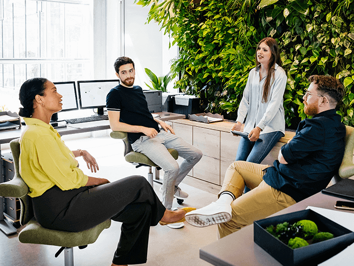 people sitting in a group talking