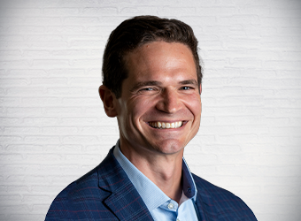 financial advisor digger bujnoch headshot image