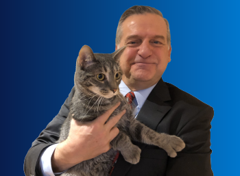 certified public accountant peter manning and office mascot cat “jack jack” headshot
