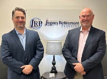 advisor Phil Eggers, operations manager Matthew Ford, Legacy Retirement Planning logo on wall