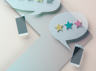 graphic-styled image with phones and stars in speech bubbles