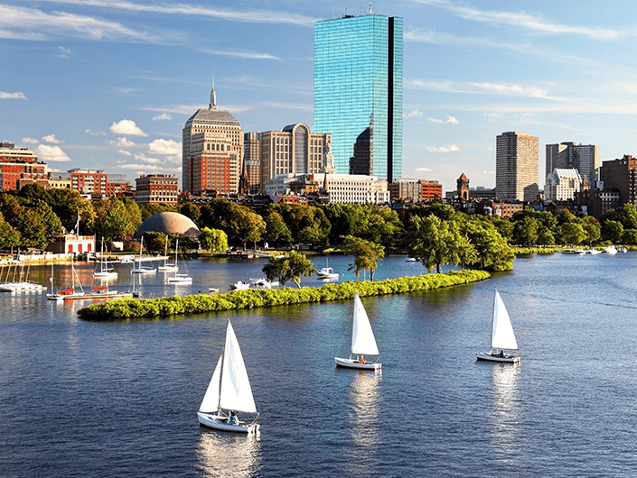 sailboats on the Charles River with Boston city skyline in background image